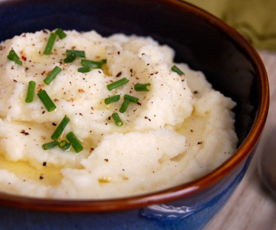 Mashed Cauliflower with Garlic- this is so good! You need to try this healthier alternative to mashed potatoes.