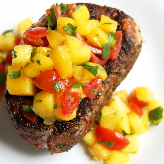 Caribbean Pork Chops with Mango Salsa- this is best mix of sweet and savory. My friends LOVE this dish and always ask me to make it for them when they visit.
