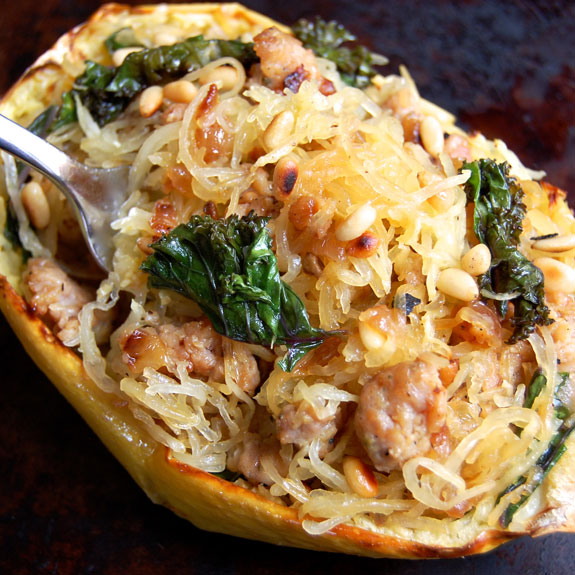 Sausage, Kale, and Spaghetti Squash Boats- this is such a soul satisfying dish! I make it every chance I get. So YUMMY!