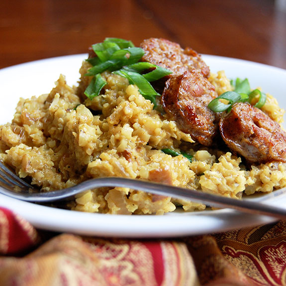 Curried Coconut Cauliflower Rice with Sausage- this is such a heartwarming dish. My friends and family love it!
