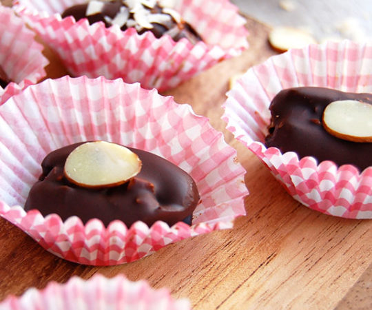 Chocolate Covered Dates- stuffed with almonds and coconut. COME TO MAMA!!!! Yum.