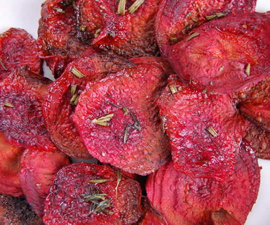How to Make the Best Baked Beet Chips- one of my favorite Paleo snacks of all-time! My friends are OBSESSED with these.