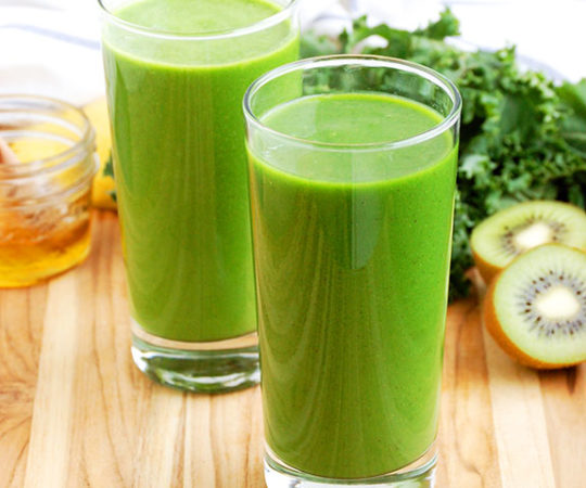 Kale and Kiwi Superpowered Green Smoothie- one of my all-time favorite Paleo smoothies! I feel like I could punch through a brick wall after drinking this, lol. Seriously though.
