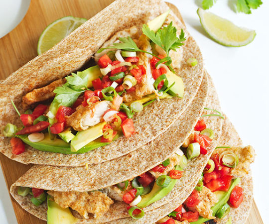 Thinly battered fish + homemade tortillas + fresh avocado and veggies = THE BEST FISH TACOS EVER! You need to try these.