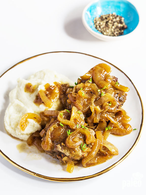 Enjoy our Paleo version of Salisbury steak and discover just how delicious it can be. Made with ground beef and topped with caramelized onion gravy, it’s sure to be a hit!