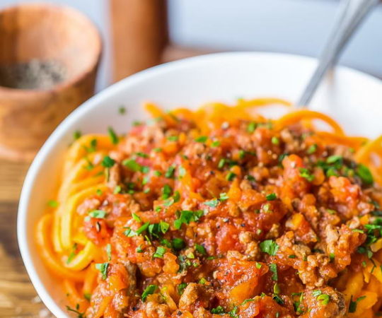 Enjoy a Paleo version of an Italian favorite: Bolognese sauce with sweet potato noodles.