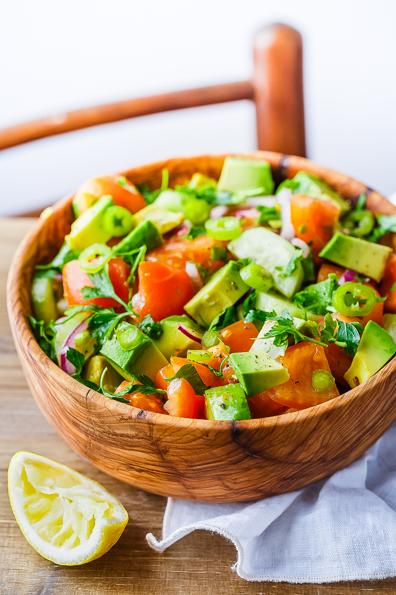 tomato avocado salad in a bowl