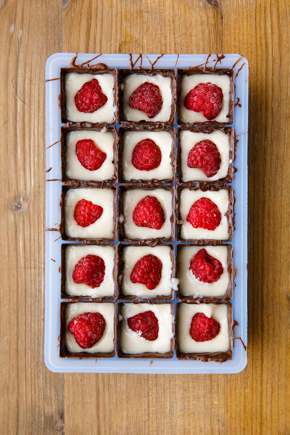 chocolate covered raspberry cheesecake bites