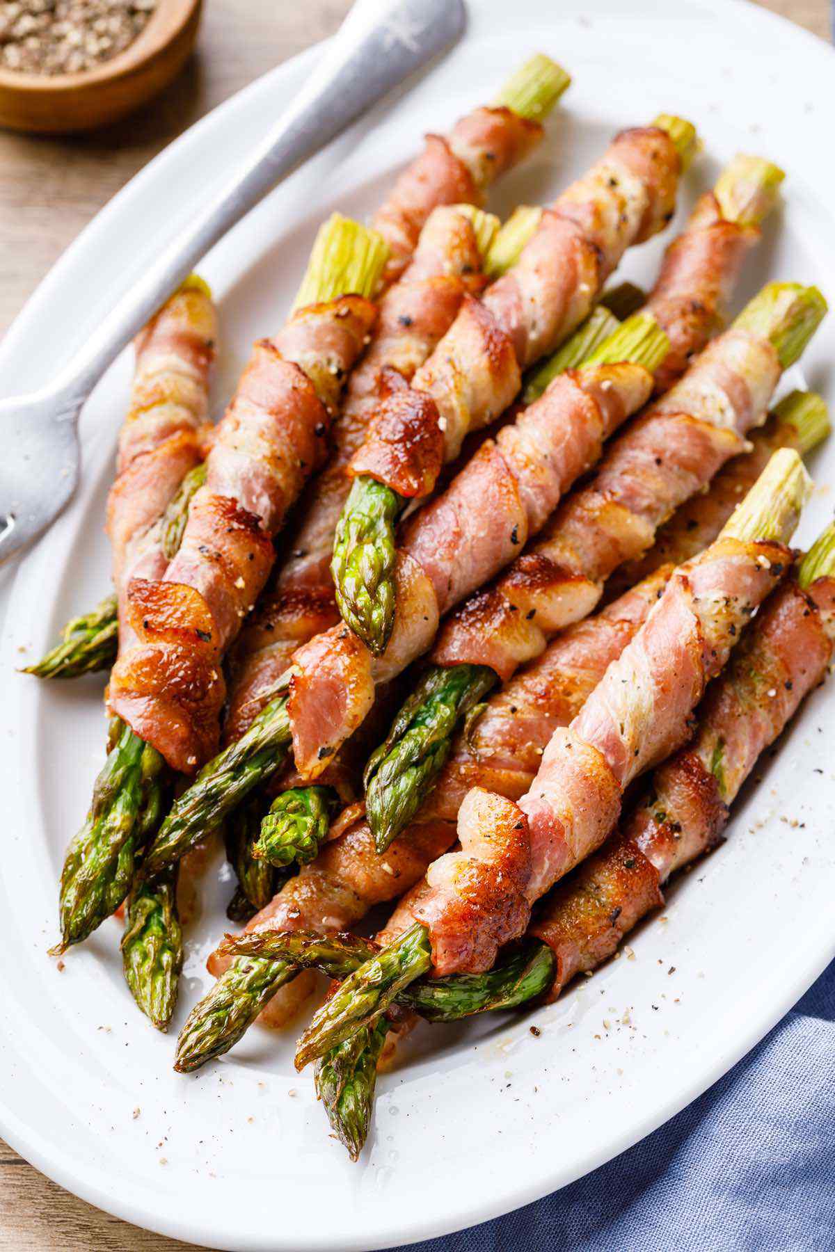 Baked Bacon-Wrapped Asparagus - Paleo Grubs